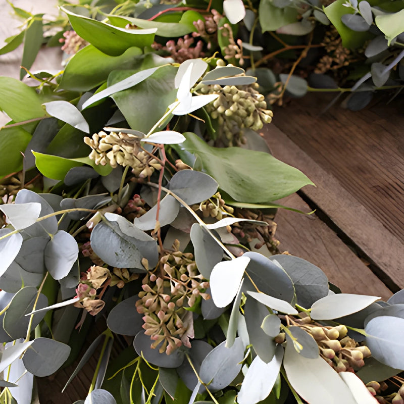 Floppy Greenery Wholesale Wreath in a hand